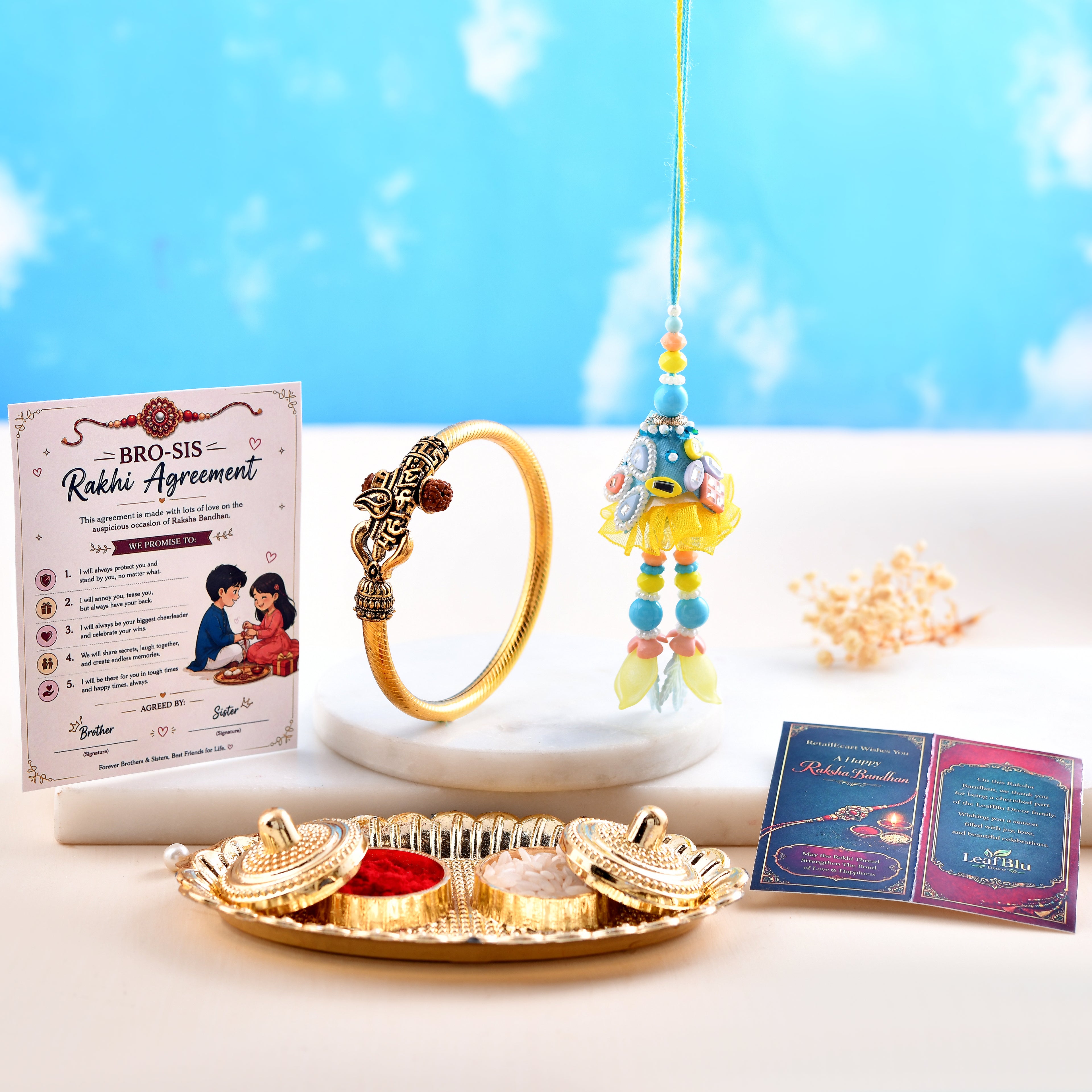 LeafBlu Premium Bhai Bhabhi Rakhi Lumba Set with Designer Golden Kada, Rakhi Agreement Card & Greeting Card | Raksha Bandhan Gift Combo