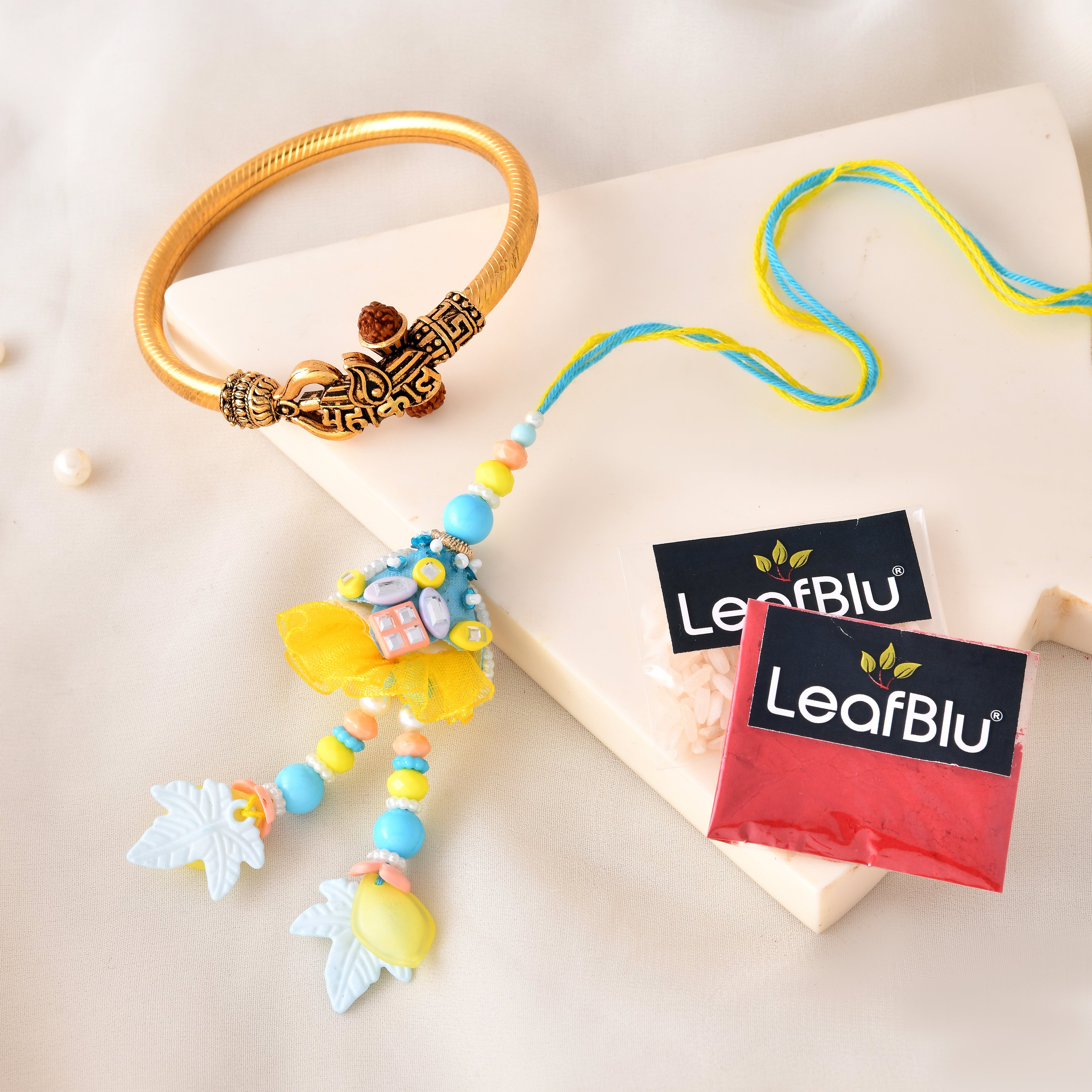 LeafBlu Premium Bhai Bhabhi Rakhi Lumba Set with Designer Golden Kada, Rakhi Agreement Card & Greeting Card | Raksha Bandhan Gift Combo