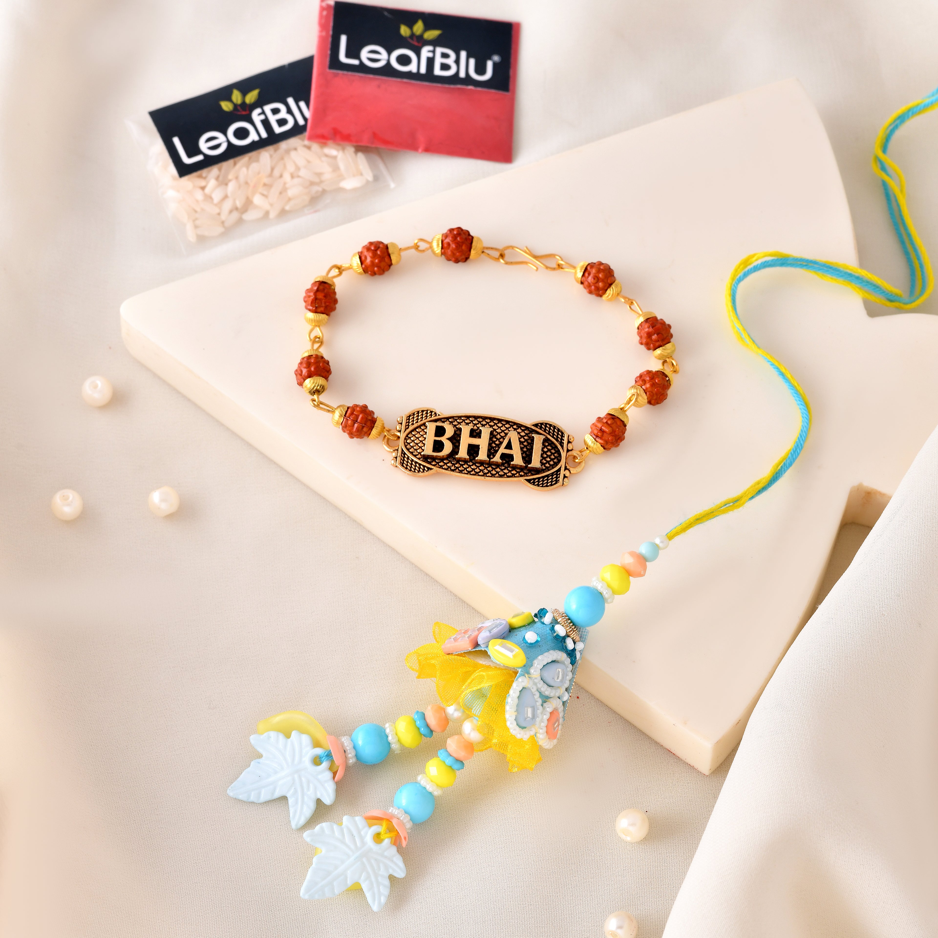 LeafBlu Premium Bhai Bhabhi Rakhi Lumba Set with Bhai Name Rudraksha Bracelet, Rakhi Agreement Card, Greeting Card & Roli Chawal | Handmade Raksha Bandhan Gift Combo