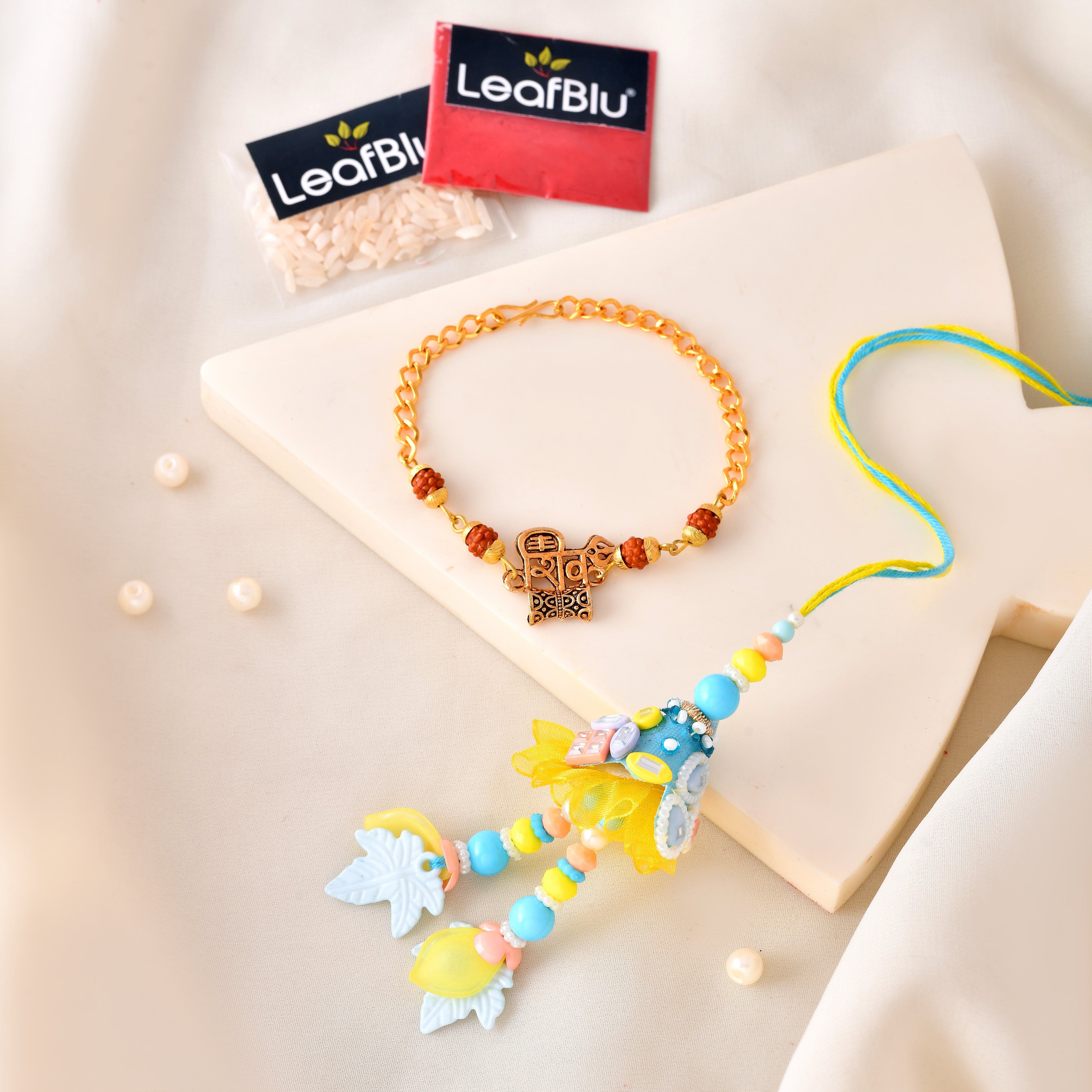 LeafBlu Premium Bhai Bhabhi Rakhi Lumba Set with Shree Ram Rudraksha Bracelet, Rakhi Agreement Card, Greeting Card & Roli Chawal | Handmade Raksha Bandhan Gift Combo